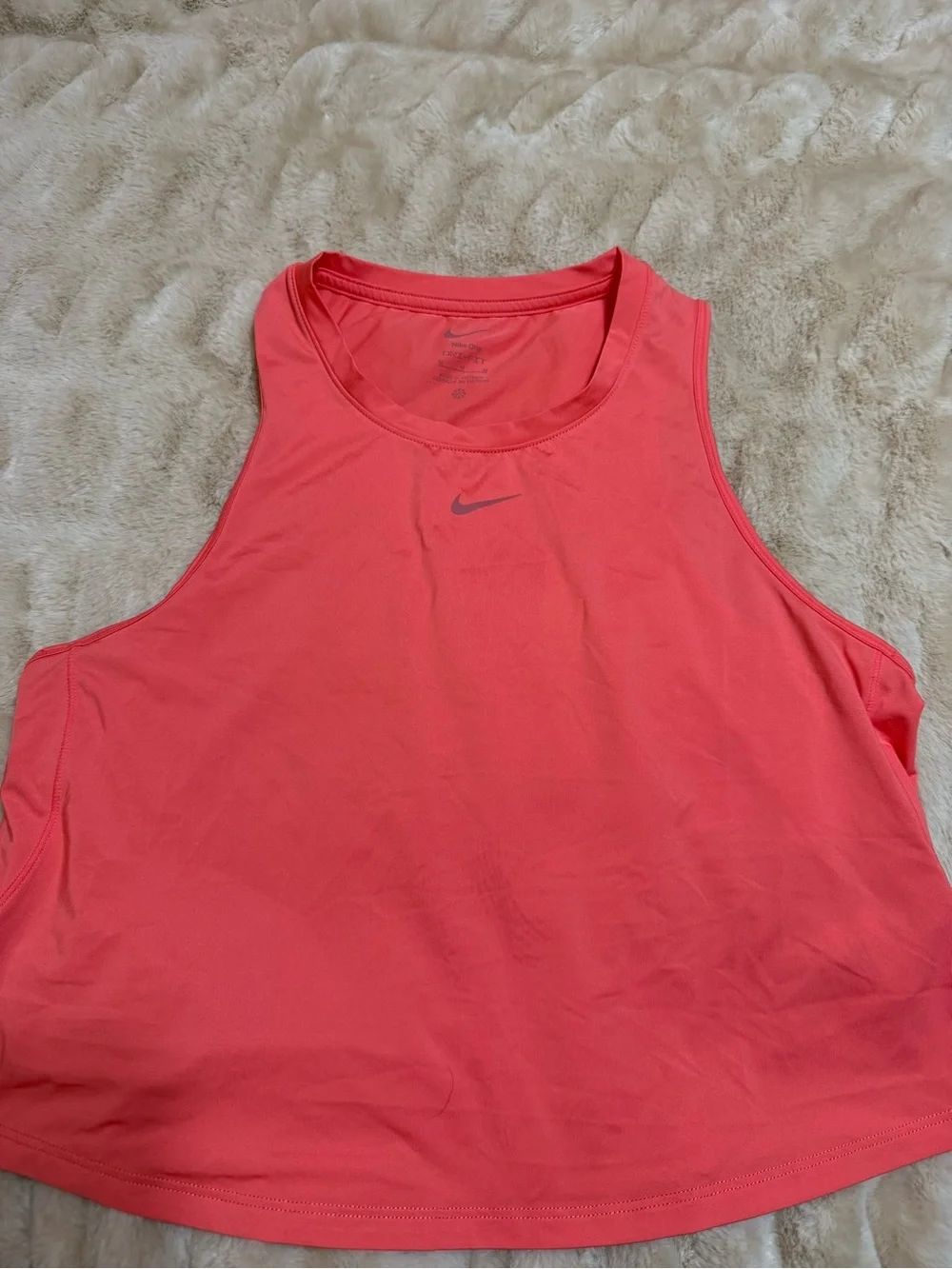 Nike Women’s Coral Pink Athletic Tank- new without tags. Was to big for me.